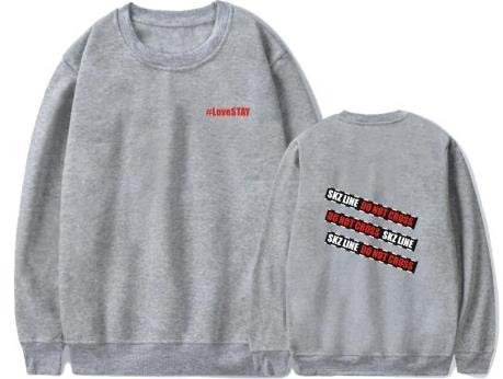 Kpop merch sweatshirt with "#LoveSTAY" text on front and bold "SKZ LINE" design on back.