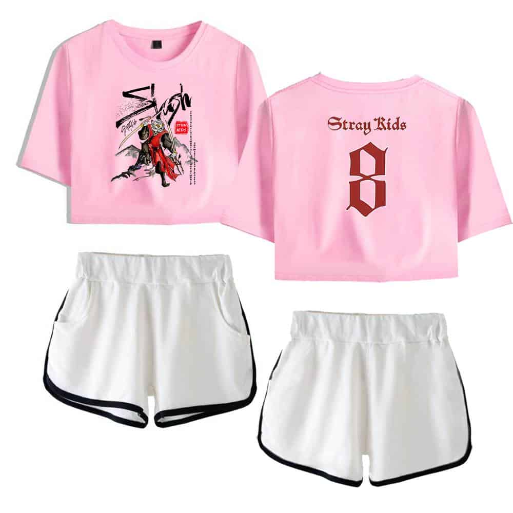 Pink graphic T-shirt with K-pop band design and white shorts with black trim, perfect for K-pop fans.