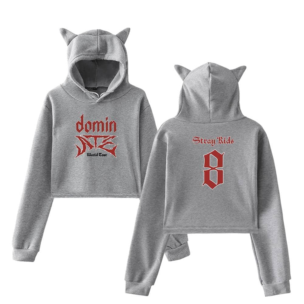 Bold grey cropped hoodie with cat ears and "domino" logo and "Stray Kids" text in red, streetwear style, perfect for K-pop fans.