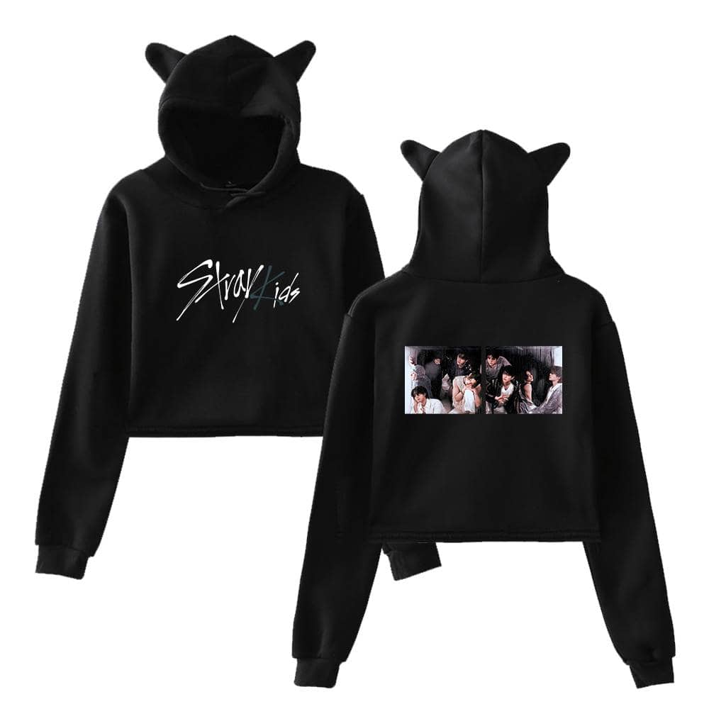 Black hoodie with "Stray Kids" logo and animal ears on the hood, featuring group images on the back, perfect for K-pop fans.
