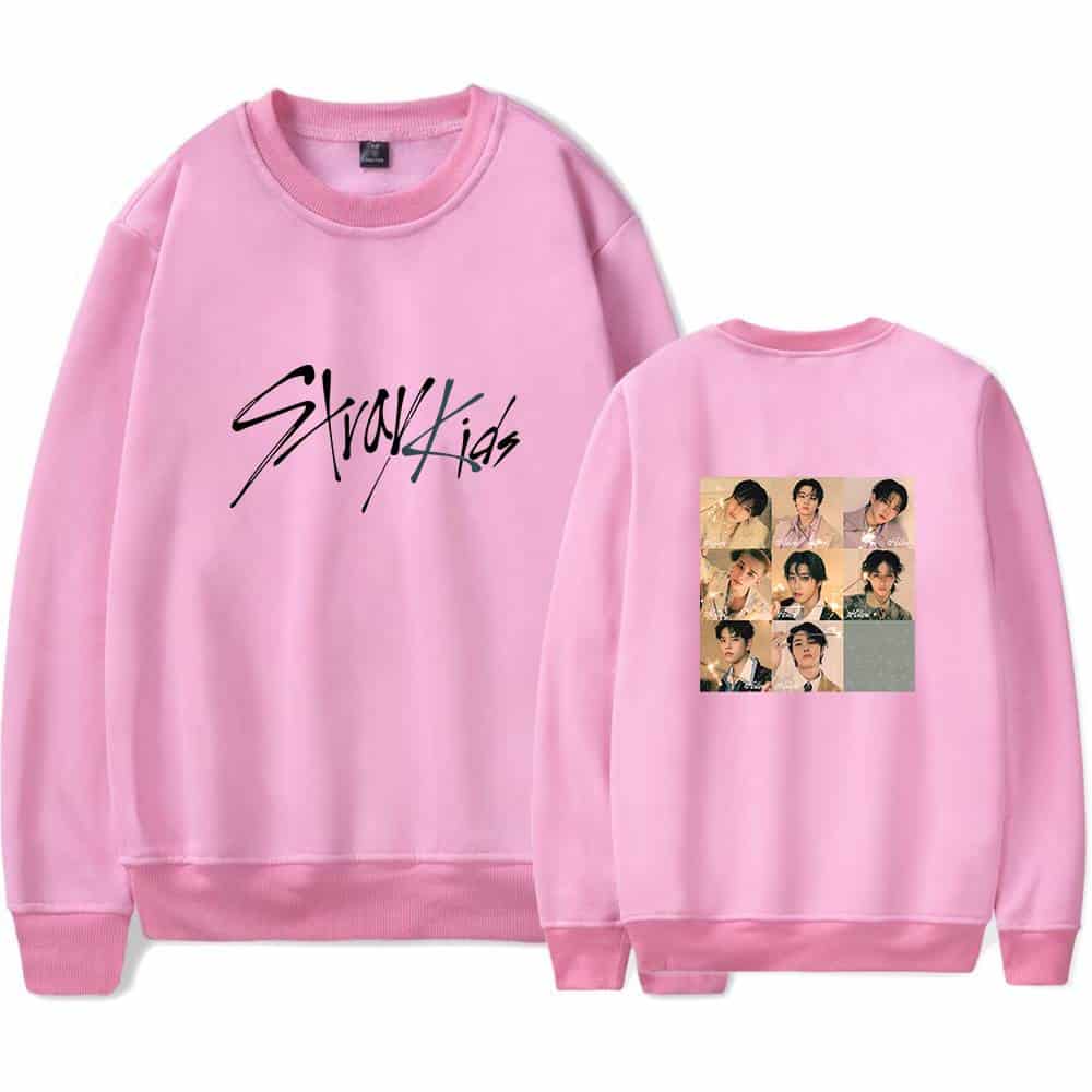 Stylish pink K-pop girl group sweatshirt with "Stray Kids" logo and BTS members collage back print. Perfect for K-pop fans and merchandise collectors.