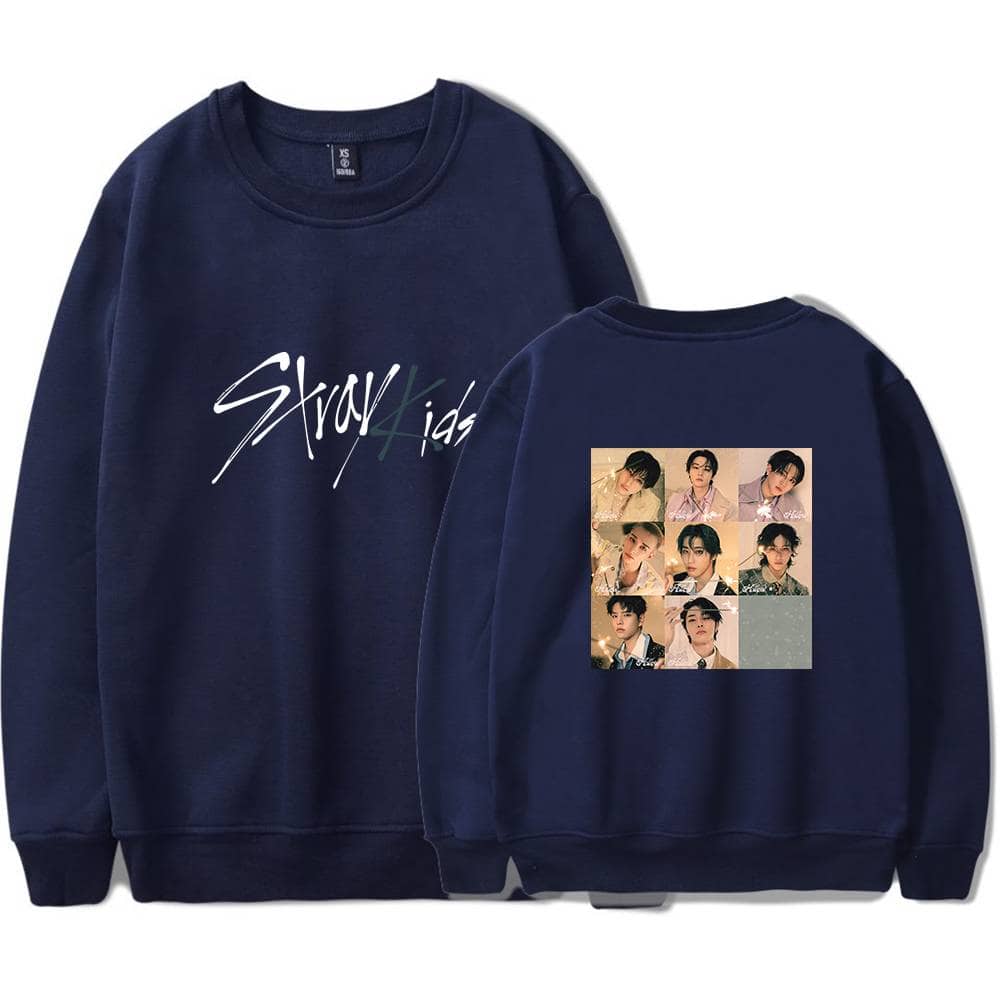 Stylish navy blue sweatshirt featuring members of the K-pop group Stray Kids, perfect for K-pop fashion fans and music lovers.
