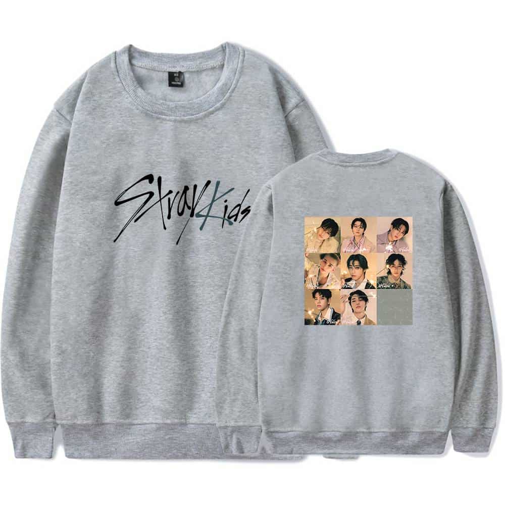 Kpop merch sweatshirt featuring Stray Kids design and album photos.