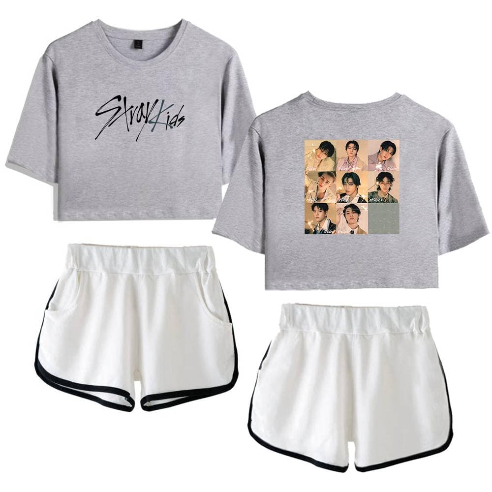 Kpop merch, stylish Kpop fan apparel set featuring cropped shirts and sporty shorts with group images and logos.