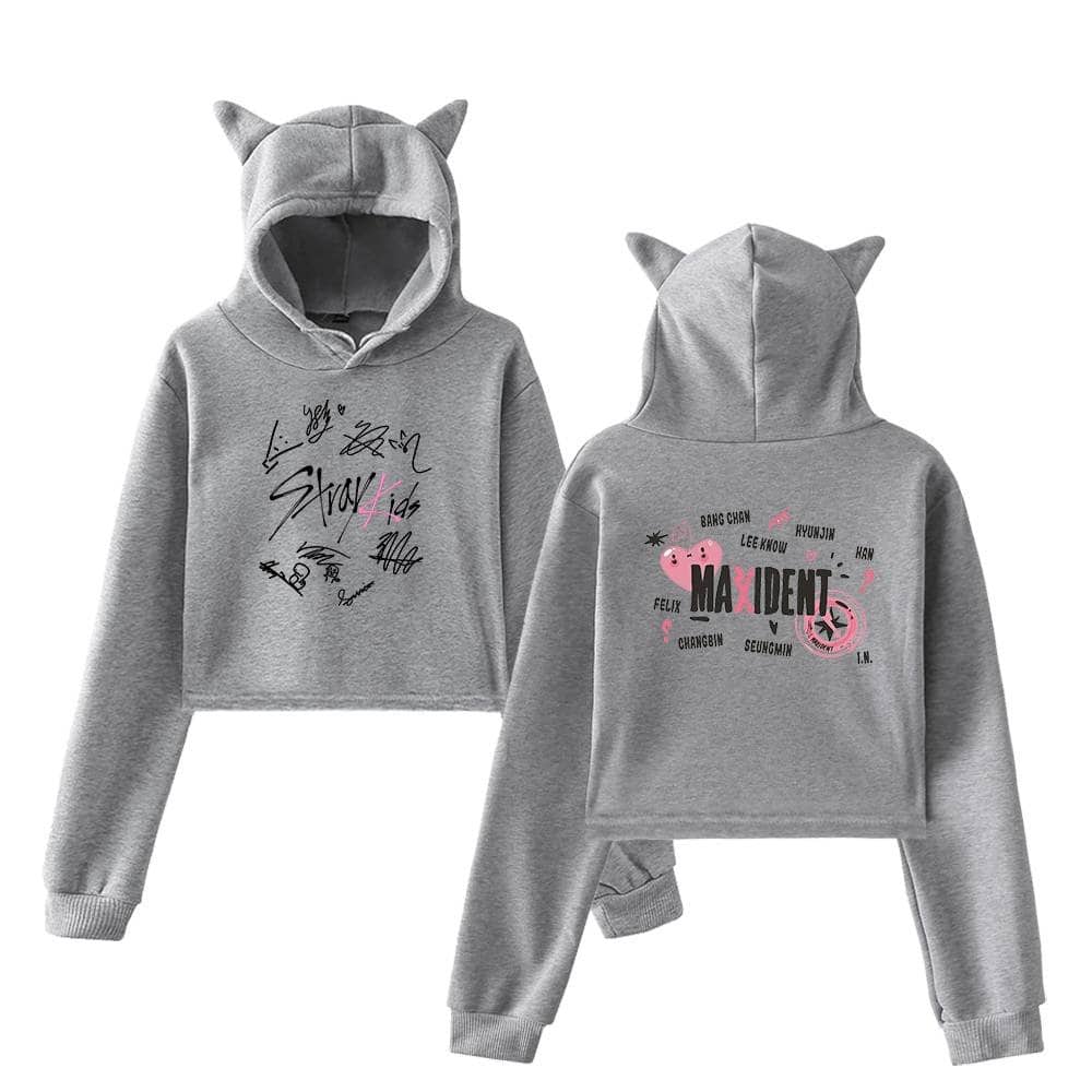 Gray K-pop hoodie set with playful signatures and Maxident theme, featuring a cute pink heart and cartoon character accents. Perfect for fans and casual wear.