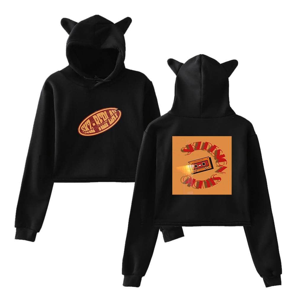 Black cropped hoodie with cat ear hood and vibrant graphic prints, perfect for K-pop merch fans.