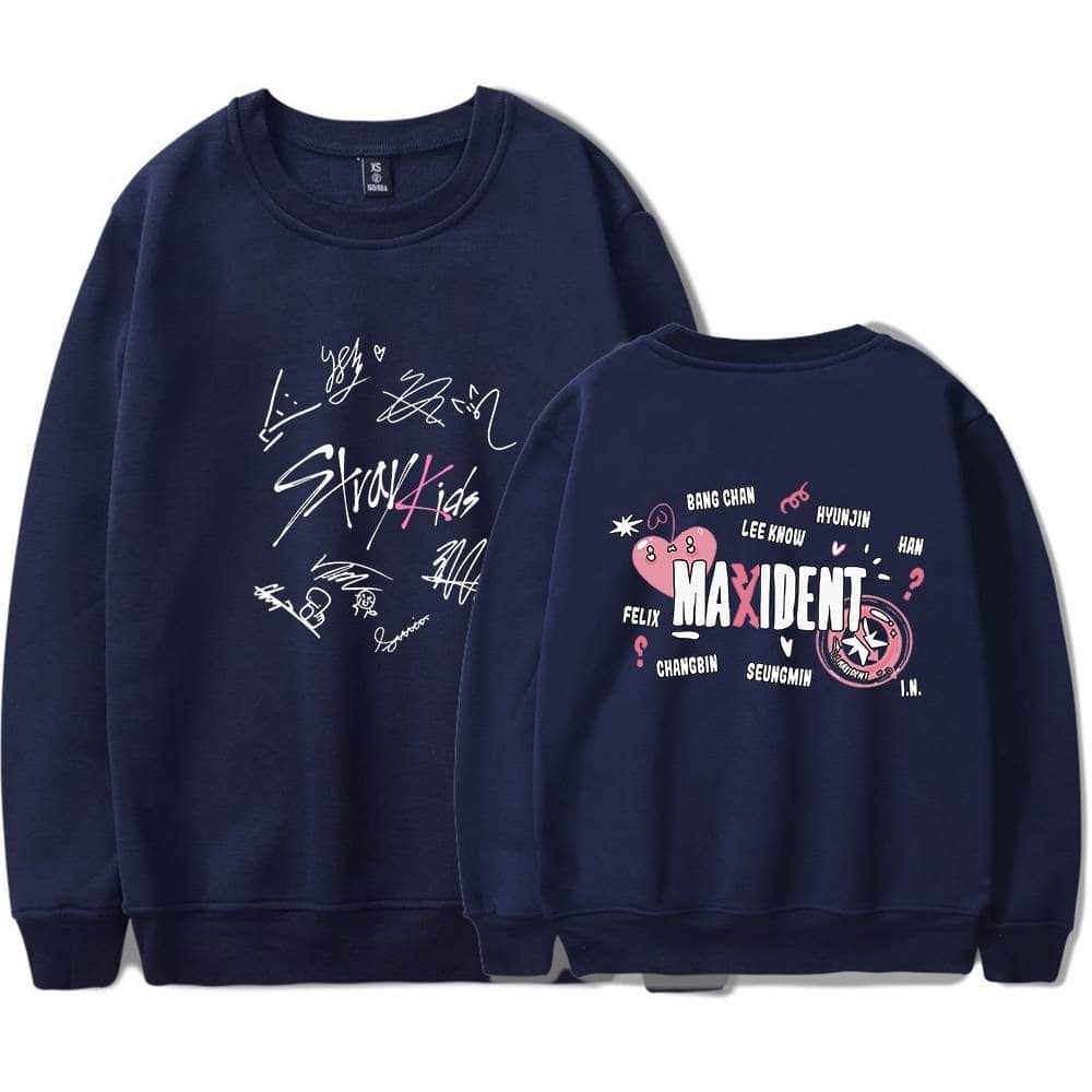 Autographed K-pop group sweatshirt with signature designs and colorful logos.