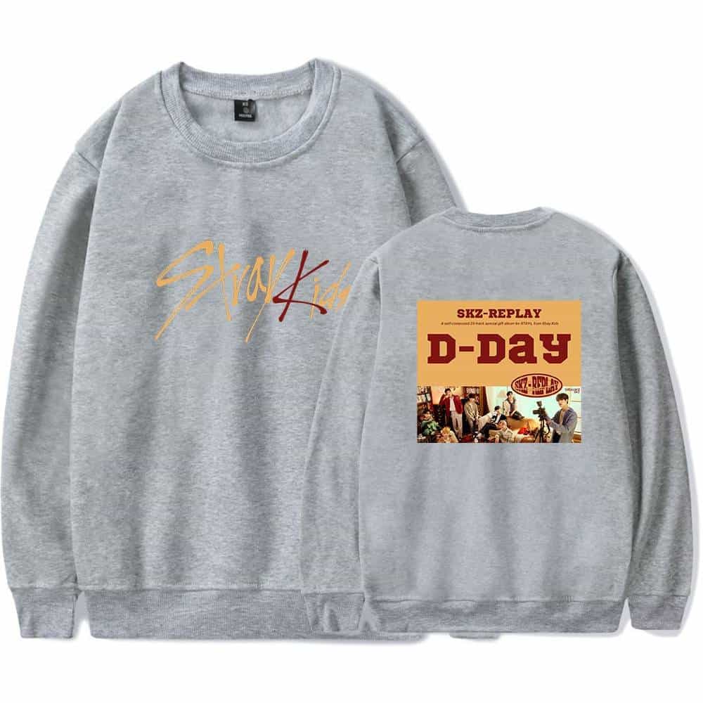 Vintage gray sweatshirt featuring SKZ-Replay D-Day album artwork and K-pop merchandise design.
