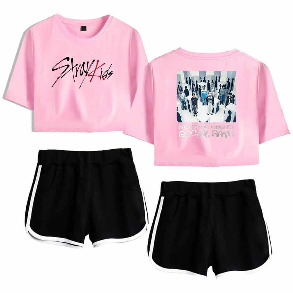 Bright pink K-pop merch crop top with group graphic and slogan.