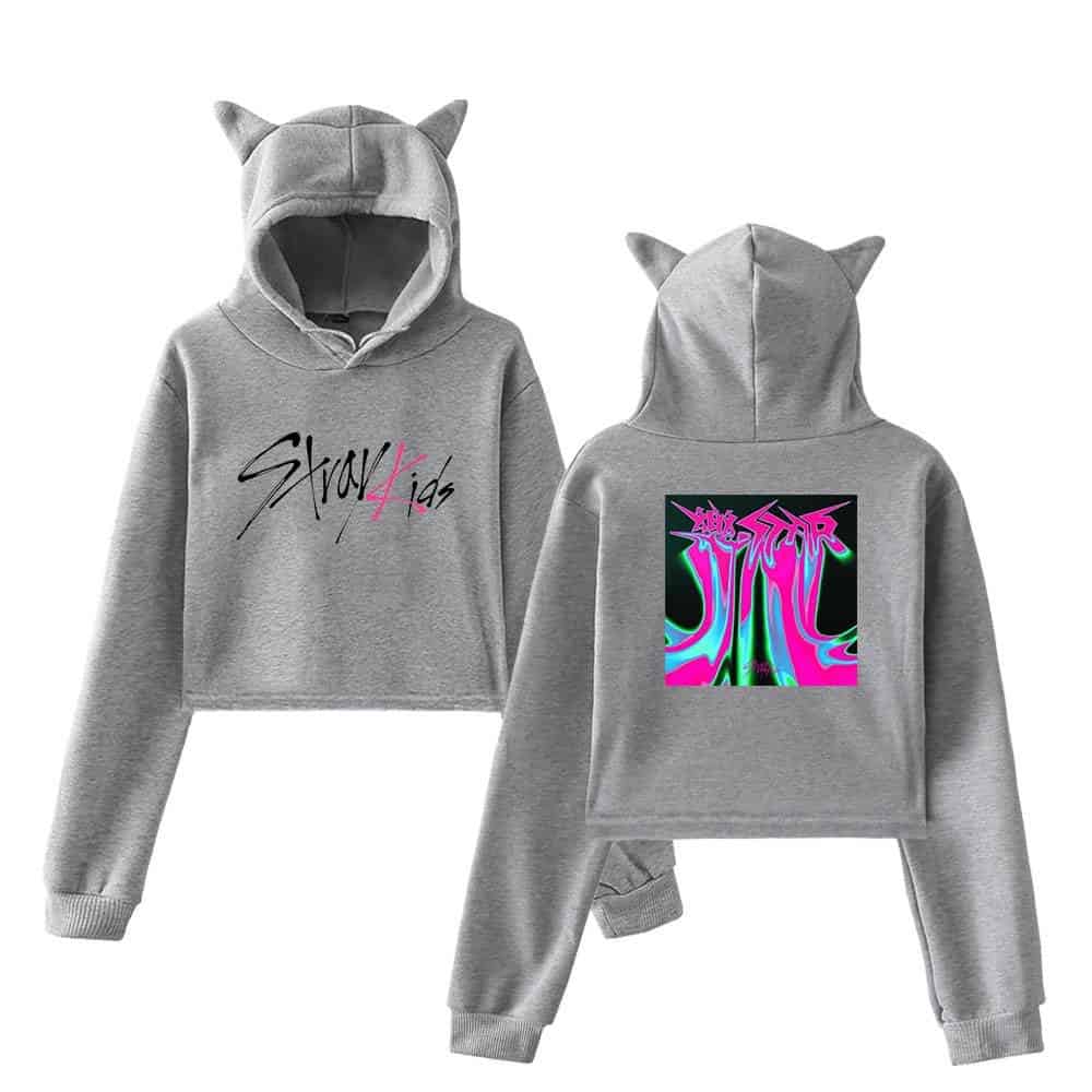 Stylish gray K-pop hoodie with cat ears, featuring "Stray Kids" logo design on the front and vibrant, abstract artwork on the back. Perfect for fans and streetwear fashion.