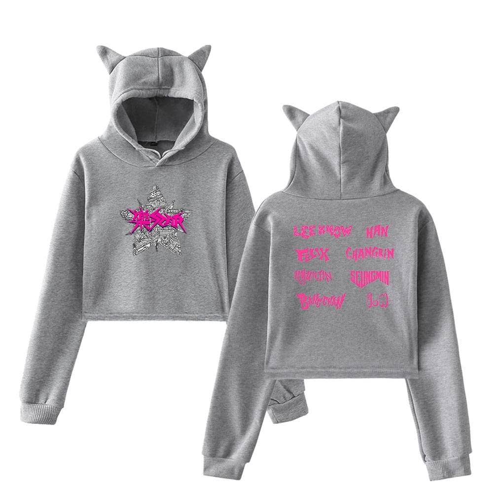 Pink and gray hoodie with playful text and star graphic, featuring cat ears on the hood, perfect for K-pop fans and merchandise collectors.