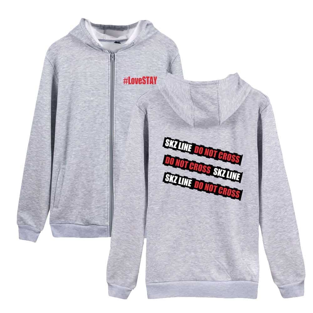 Gray zip-up hoodie with SKZ LINE and DO NOT CROSS text, casual Kpop merch for fans.