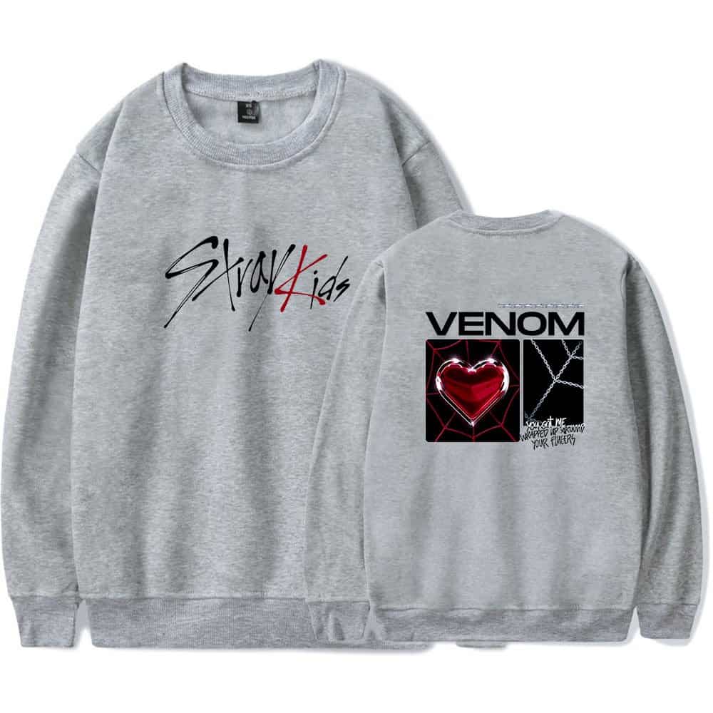 Layered sweatshirt with graphic prints for K-pop fans, featuring text and vibrant artwork from Venom and Stray Kids collections. Perfect for K-pop merchandise lovers.